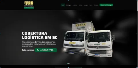 Screenshot of the Petry Distribuidora website homepage, showing two branded delivery trucks and a "Logistics Coverage in SC" hero section.